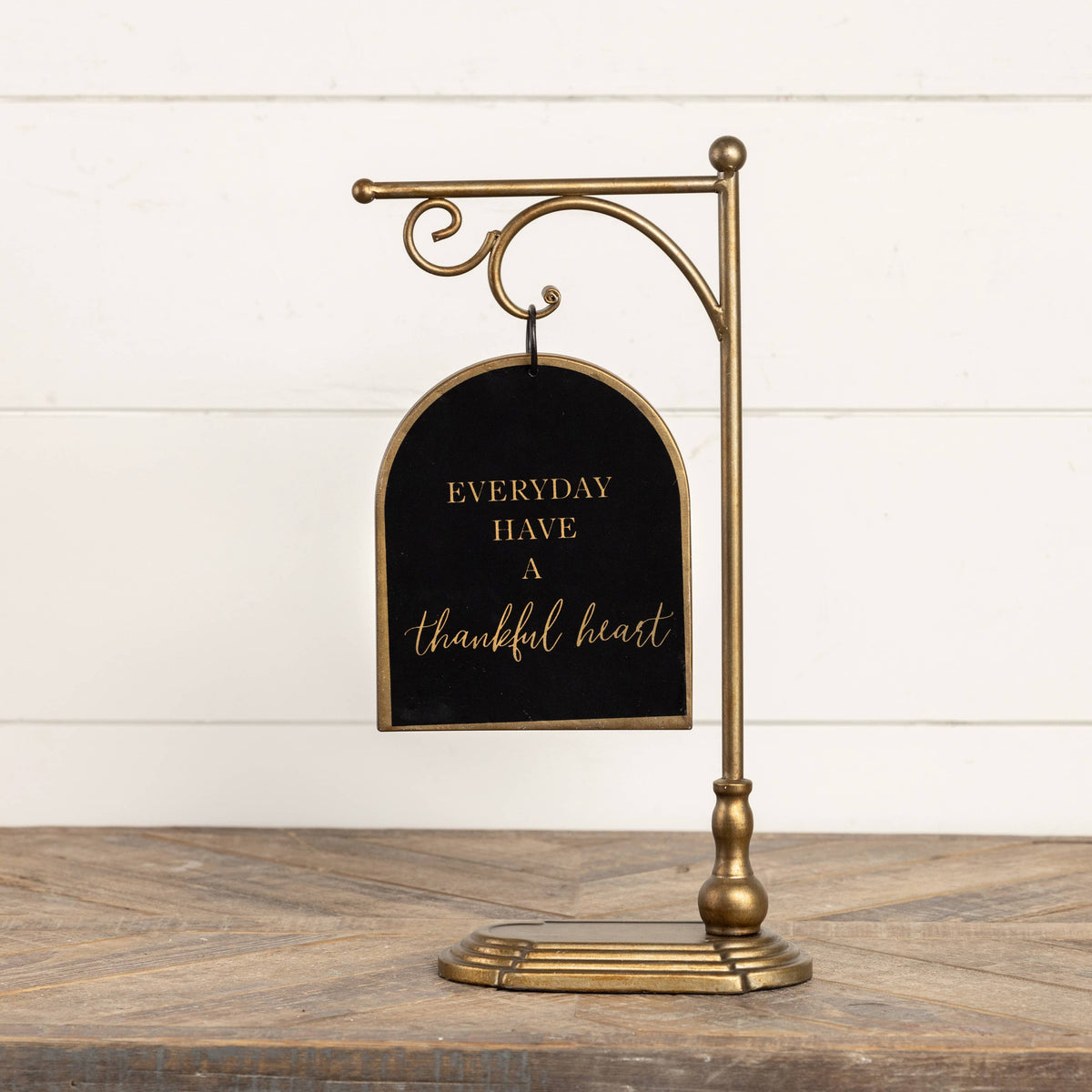 BLACK & GOLD HANGING SIGN ON STAND